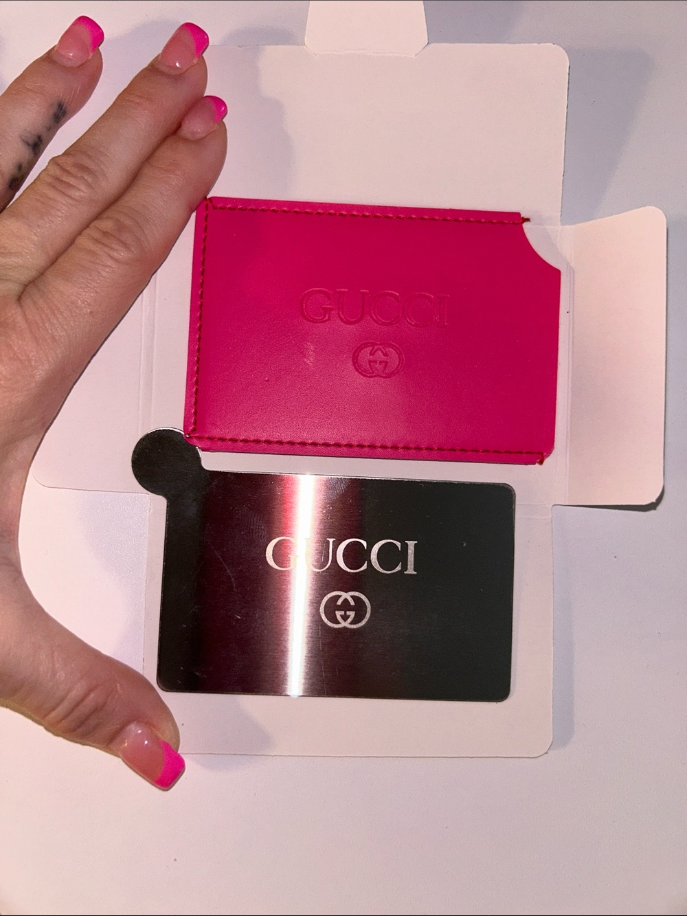 Gucci card holder/mirror in hot pink, new with film on mirror& in package NIB